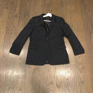 A boys original Lorenzo blazer goes great with a white shirt and black pants.